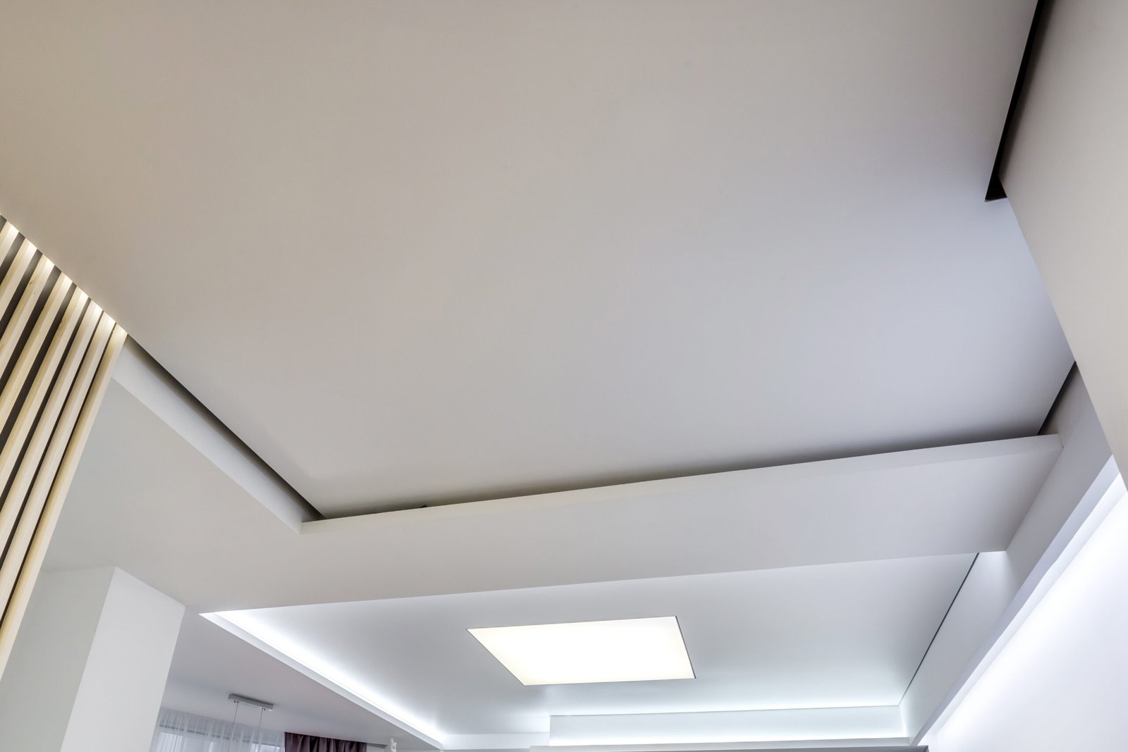 halogen spots lamps on suspended ceiling and drywall constructio